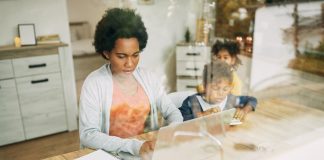 How small business owners are leveraging embedded finance to achieve their goals Small business owner researching embedded finance