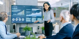 From boring to brilliant: How to deliver engaging business presentations Woman gives business presentations to her colleagues